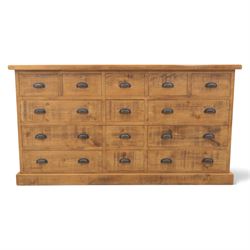 Indigo Furniture - large rustic oak combination chest sideboard, fourteen drawer with blac...