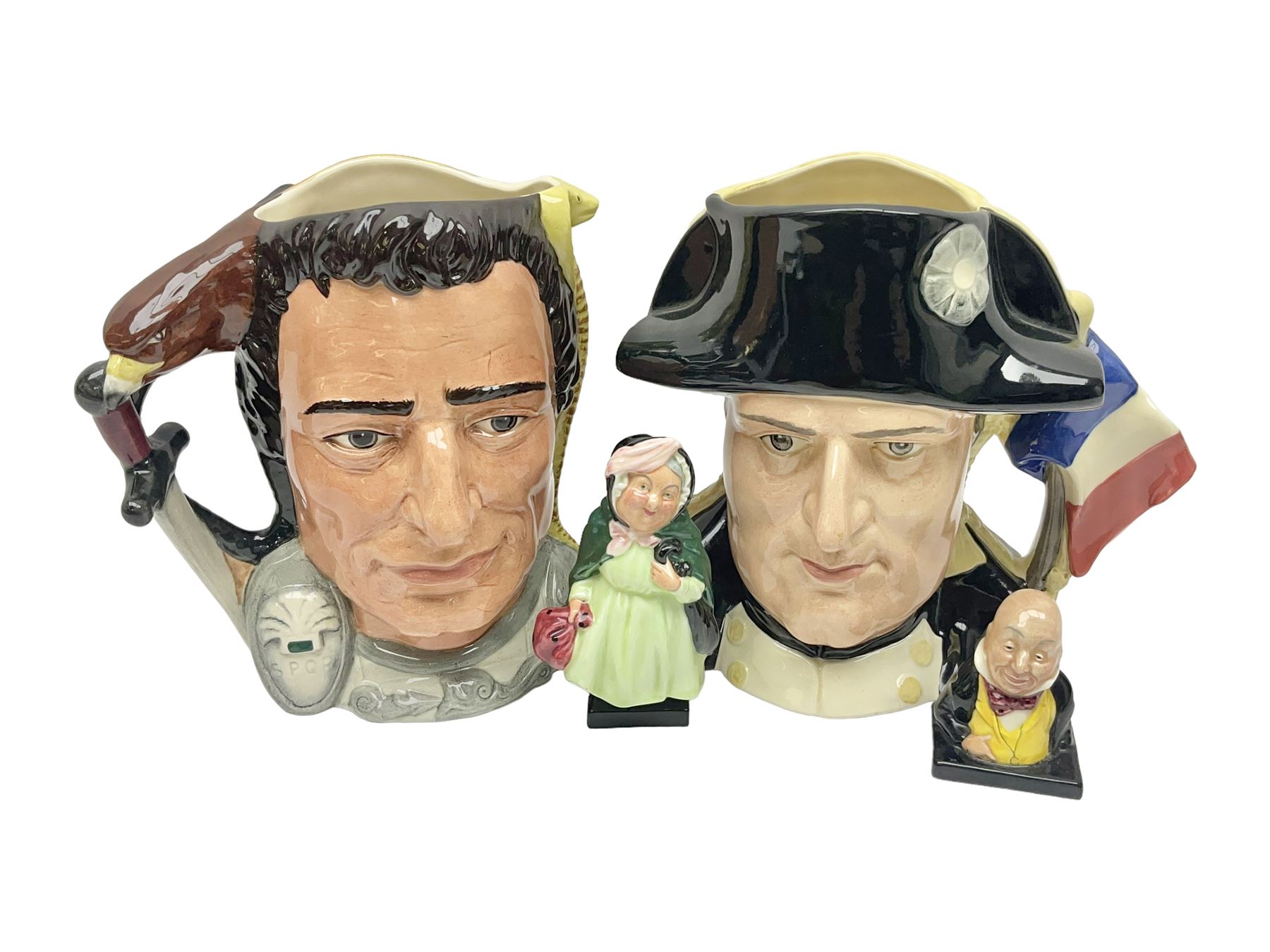 Royal Doulton two character jugs from the Star Crossed Lovers Collection, Antony & Cleopatra D6728 and Napoleon & Josephine D6750, together with two Royal Doulton Figures Micawber and Sairey Gamp