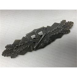 Three WW2 German badges - Close Combat Clasp; Army Flak badge; and Wound badge