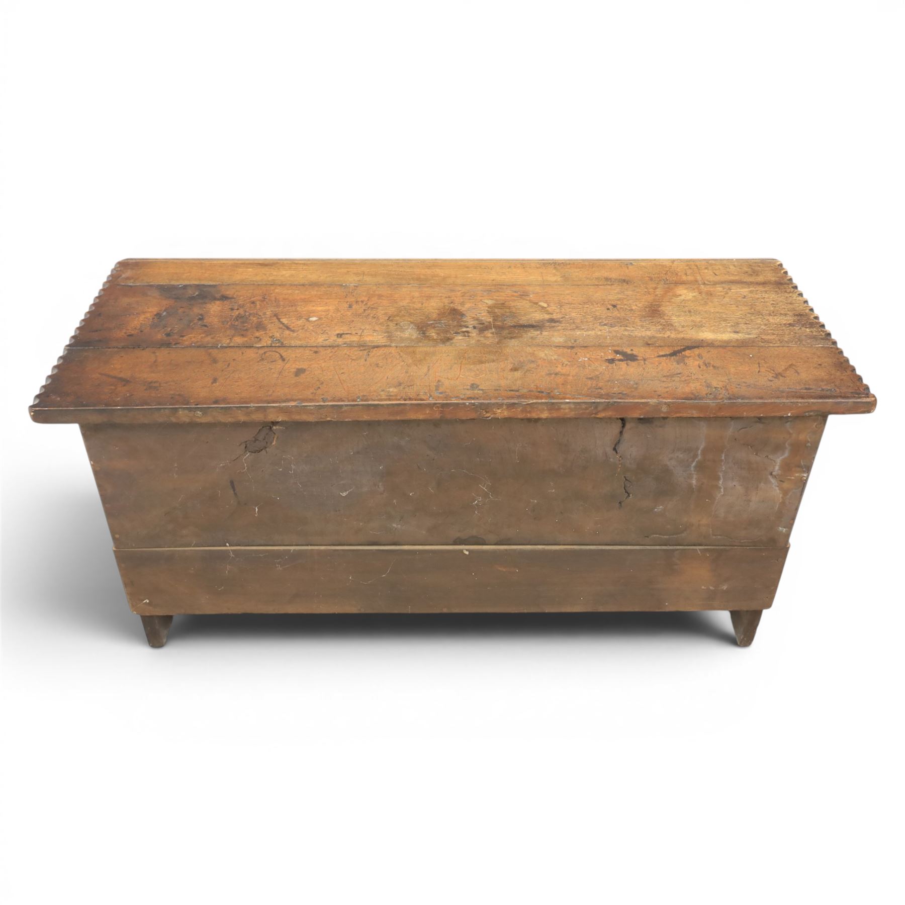19th century oak boarded blanket box, with chip-carved edges, raised on shaped cut away bracket supports
