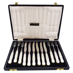 1930s silver mother of pearl handled fruit knives and forks, the blades and prongs hallmarked Z Barraclough & Sons Ltd, Sheffield 1935, the silver ferrules hallmarked Sutherland & Roden, Sheffield 1918, within tooled leather silk and velvet lined fitted case