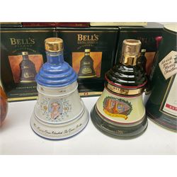 Dimple 15 Year Old Blended Scotch Whisky, together with nine Bells, scotch whisky, in Wade ceramic decanters, including Christmas 1991, 1998, 1996 etc, of various contents and proof 