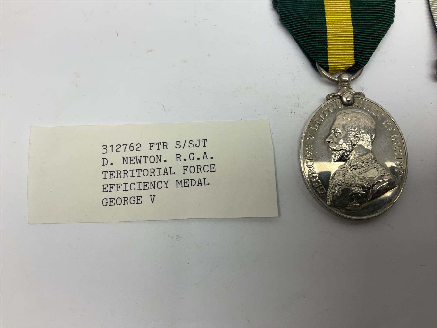 George V Naval Long Service and Good Conduct Medal awarded to K19570 J.L. Honeysett L. Sto. H.M.S. Royal Oak; and George V Territorial Force Efficiency Medal awarded to 312762 Ftr. S/Sjt. D. Newton R.G.A.; both with ribbons (2)