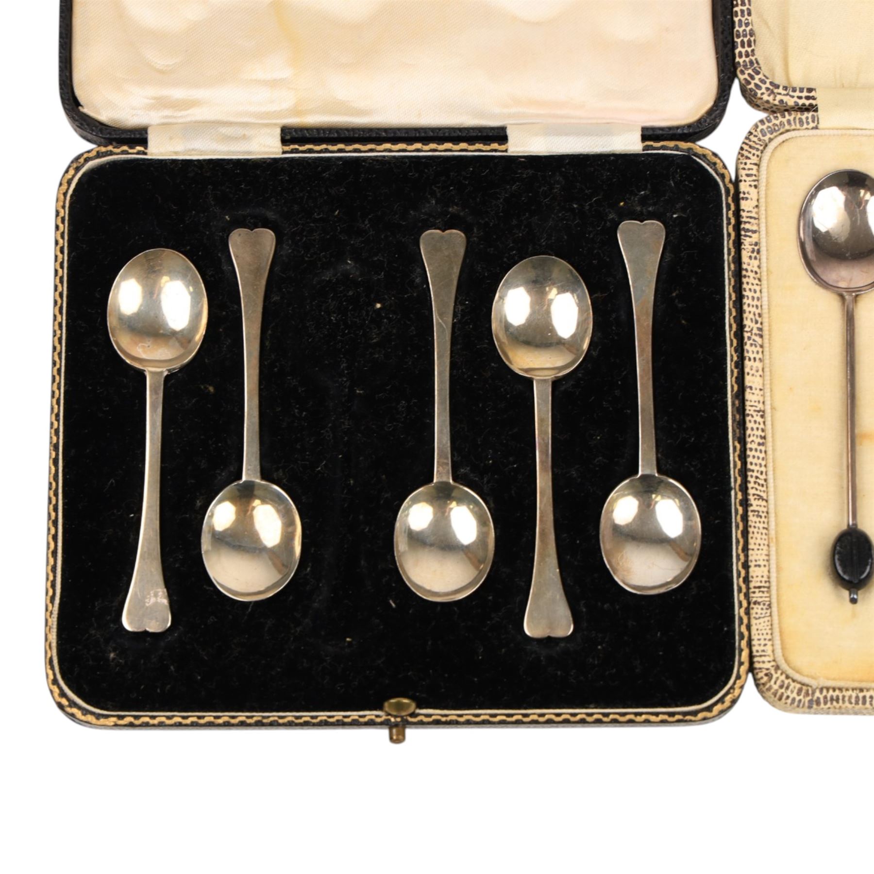 Set of six silver coffee bean spoon and a set of five silver coffee spoons, all hallmarked, in fitted case
