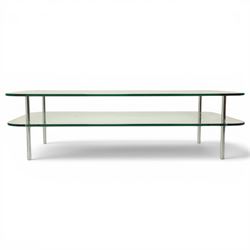 Contemporary glass coffee table with chrome supports