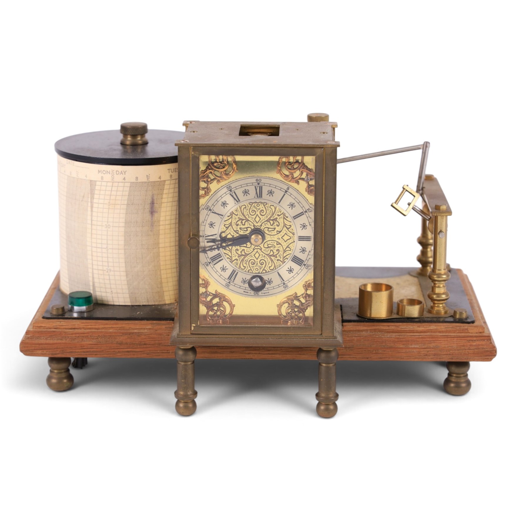 Brass barograph with integral brass clock, upon a wooden wooden plinth