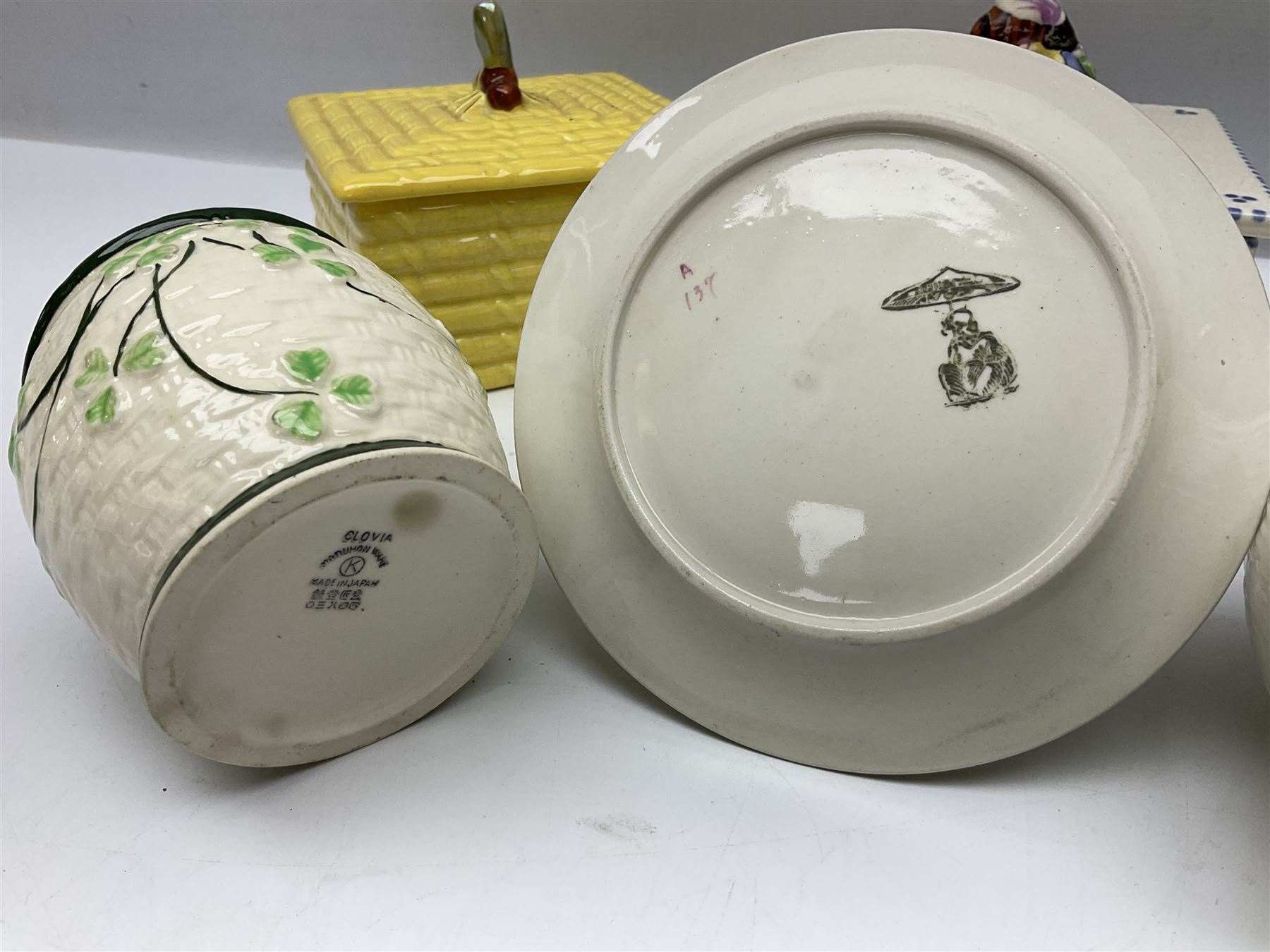 Clarice Cliff for Wilkinson Ltd Crocus Bizarre beehive honeypot painted in the Crocus pattern, together with two beehive Beswick honey pots, Poole square honey pot etc (14)