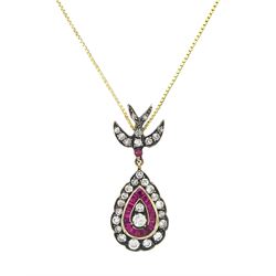 Gold and gold-plated diamond and ruby pendant necklace, the pear shaped pendant, milgrain ...