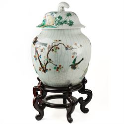 Late 19th century Chinese famille verte crackled ice pot and cover, of ovoid form, decorated with birds, blossom and bamboo, the cover with handle formed as a root, with hardwood display stand H50cm