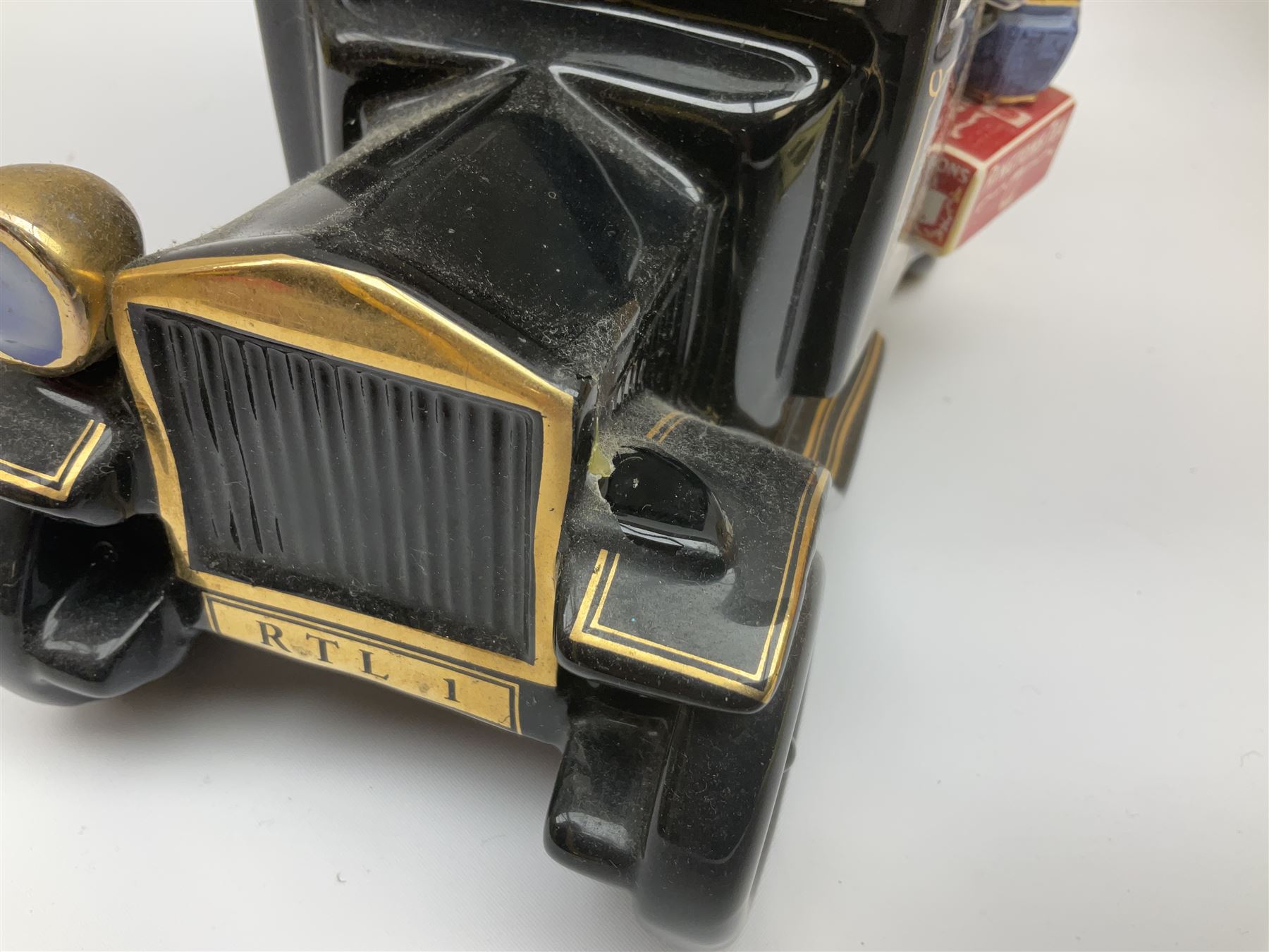 Ringtons novelty teapots, comprising the Ringtons Delivery Van teapot, and the Tea Merchant teapot, both with boxes and certificates of ownership.