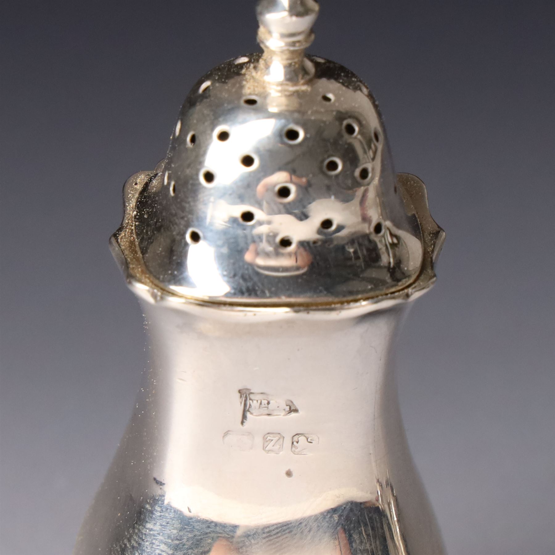 Silver salt and mustard pot with gadrooned edge on paw feet and with blue glass liners Birmingham 1919 and a similar pepperette