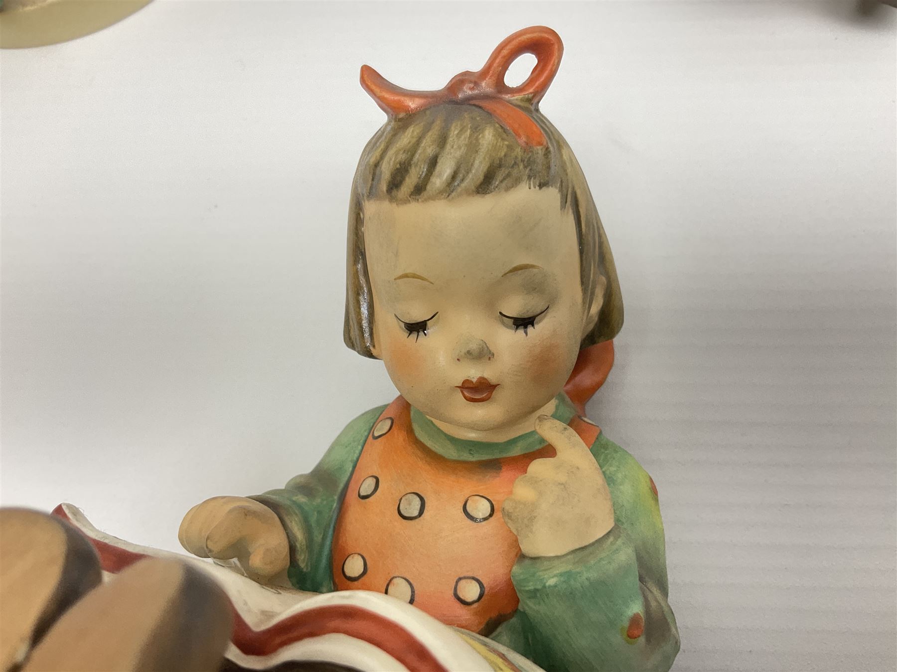 Twenty five Hummel figures by Goebel, to include Tuning up, Blessed Event, Book Worm, The Little Architect etc 