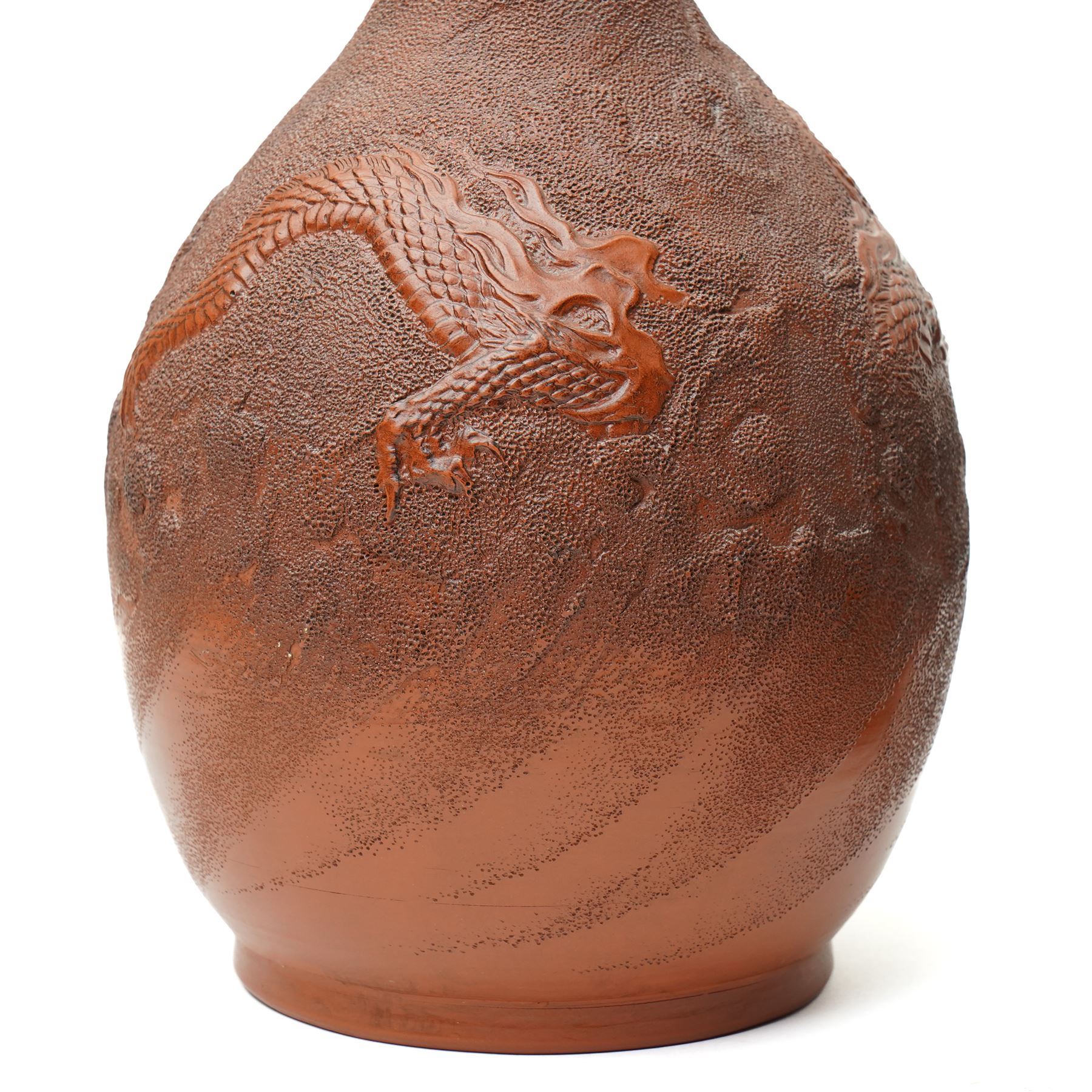 Pair of Chinese redware vases in the Yixing style, early 20th century, decorated with dragons among clouds, one bearing impressed marks to base, H30cm (2)