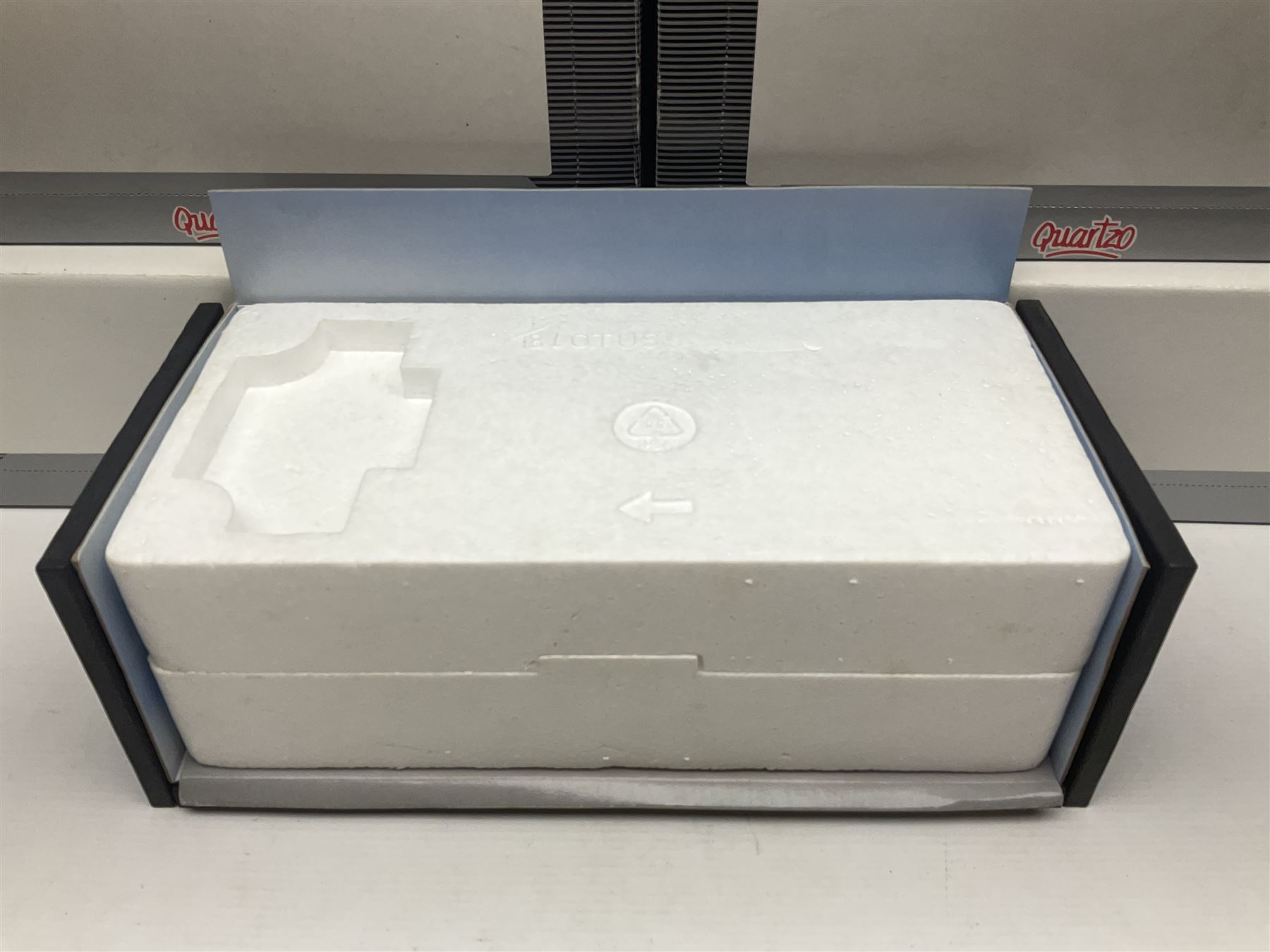 Four Quartzo/A-Model 1:18 scale die-cast racing cars - Lotus 72D 'JPS' Winner British G.P. 72 Emerson Fittipaldi; Lotus 49 Winner British G.P. 67 Jim Clark; Lotus 49B U.S.A. G.P. 68 Mario Andretti; and Lotus 49B Winner Monaco G.P. 68 Graham Hill; all boxed (4)