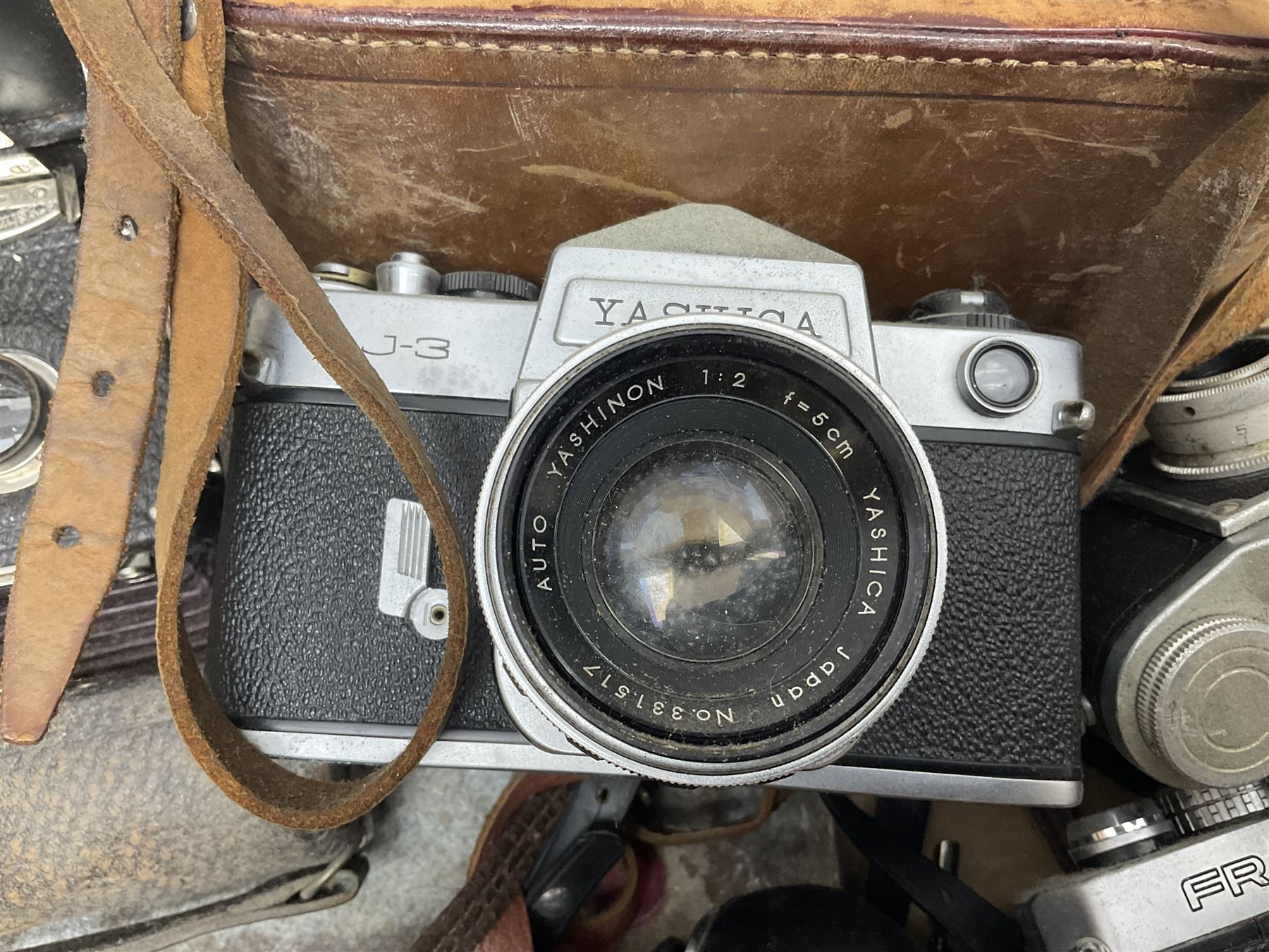 Large collection of cameras to include folding and SLR examples, including Rank Aldis, Agfa, Yashica, etc