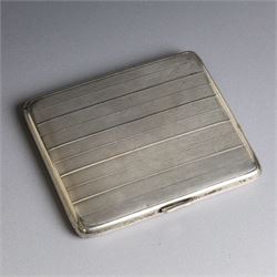 1920s silver cigarette case, of rectangular form with engine turned decoration, hallmarked Alfred Dunhill & Sons, London 1929, H9.5cm