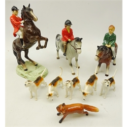  Beswick hunting group comprising Huntsman on rearing horse no. 868, five hounds and fox with two matching Bretby ponies and riders (9)  