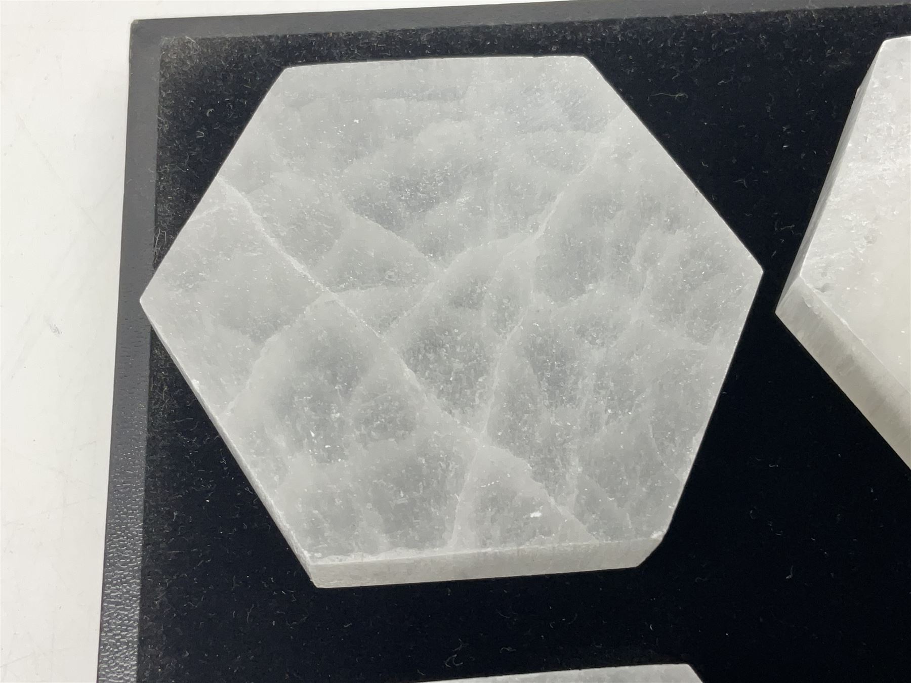 Set of six selenite hexagonal coasters, D7cm
