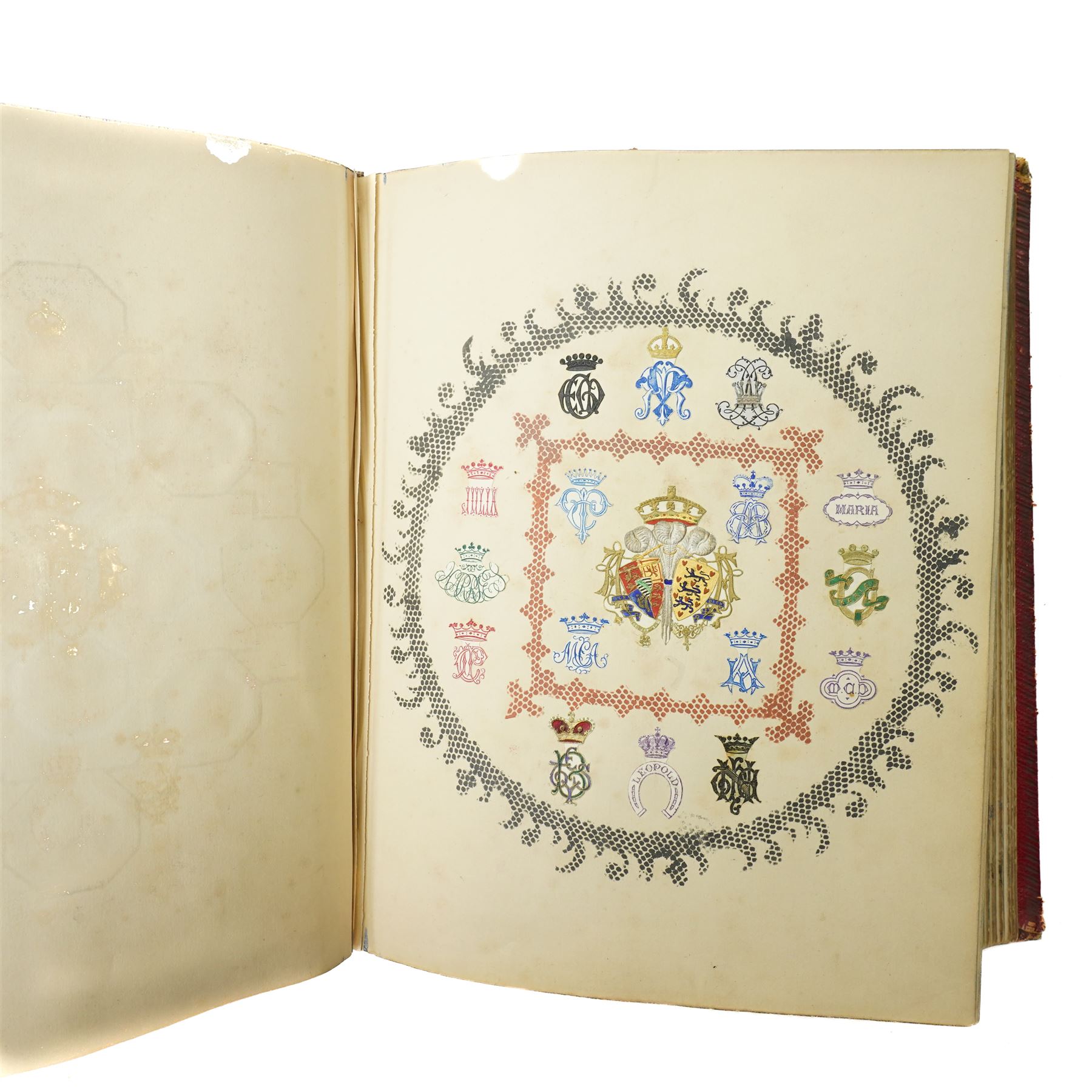 Victorian scrap book intricately worked with scraps heightened in watercolour with crests, military subjects and others on sixty five pages