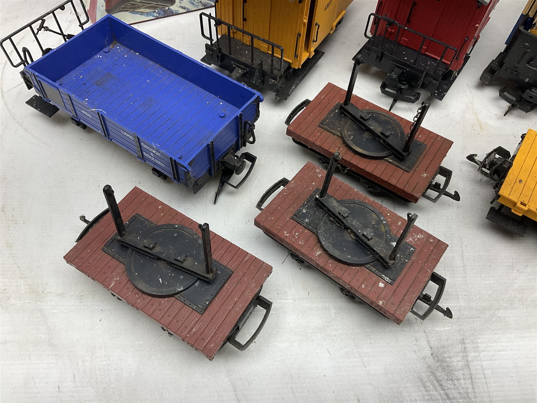 Three LGB (Lehmann Gross Bahn) G scale, gauge 1, rolling stock wagons, comprising two Lake George and Boulder wagons and an Auto Express wagon, together with a LGB passenger coach, other LGB rolling stock and a Lehmann Rigi900 ski lift