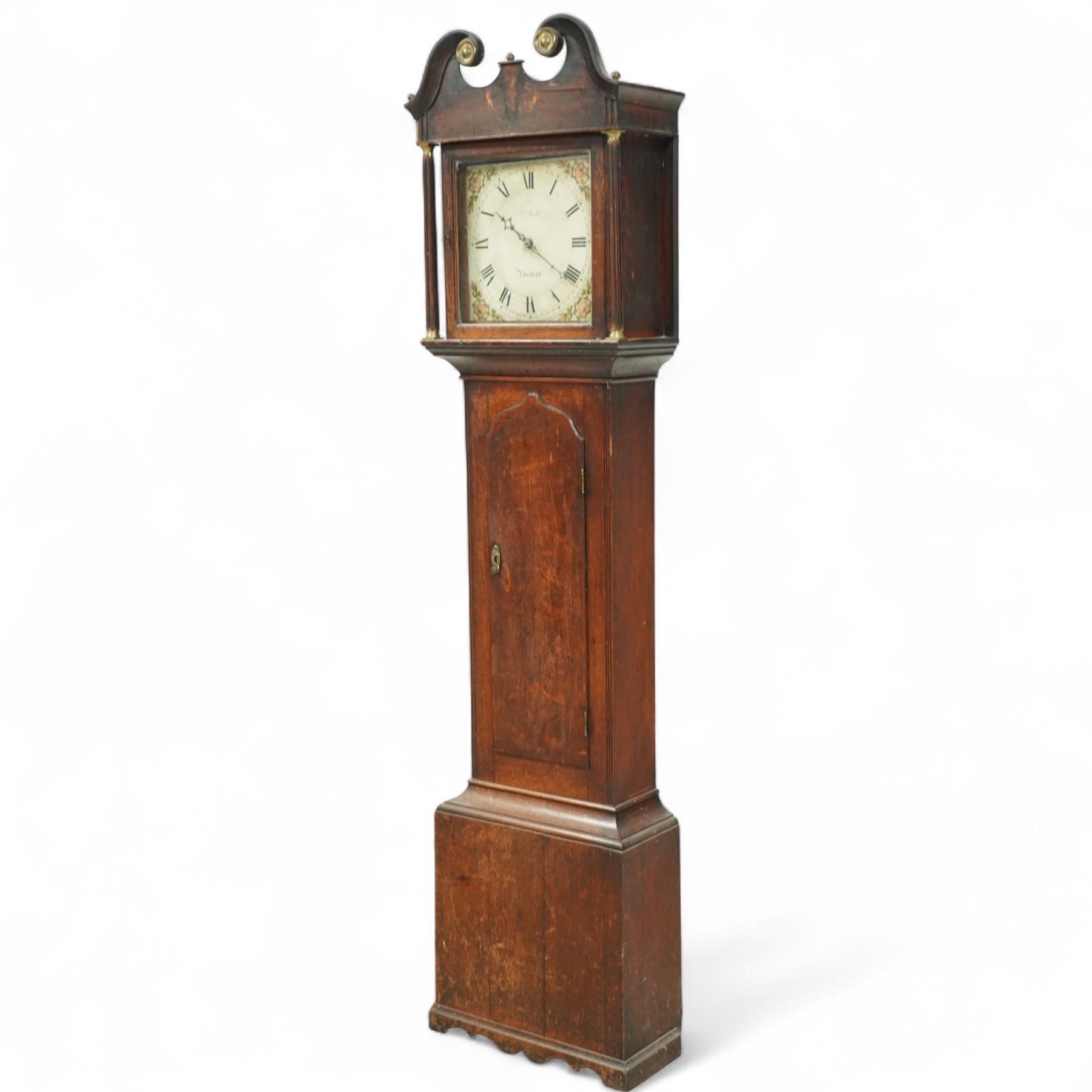 John Bull of Bedford-early 19th century provincial oak cased 30-hour longcase clock c 1830, with a swan necked pediment and brass patera, square hood door with detached reeded pilasters with brass capitals,
trunk with a long door with a shaped top on a square plinth with a shaped base, painted dial with floral spandrels, makers name, steel hands, Roman numerals and minute track, dial pined to a rope driven countwheel striking movement, striking the hours on a bell. With pendulum.
John Bull (1802-1870) was the founding father of a prodigious family of Bedfordshire clockmakers working in Bedford from the early 19th century until the mid 20th century. 