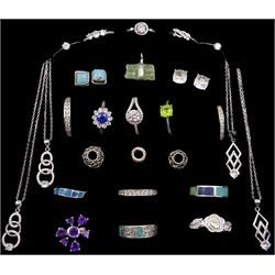 Collection of silver and silver stone set jewellery including sixteen rings, earrings, charms and four cubic zirconia pendant necklaces, all stamped or tested