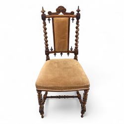 Pair of 19th century oak hall chairs, shield form backs with carved scroll cresting and finial uprights, upholstered in tan velvet, on turned and block supports joined by stretcher rails