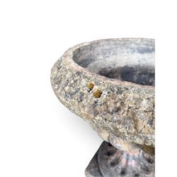 19th century terracotta campana shape urn planter, egg-and-dart moulded rim over a cherub-mask and gadrooned underbelly, turned pedestal and socle on square base