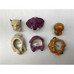 Twenty two Face Pots by Kevin Frances, to include Zhen Zhen the panda, Draco, Claw the Sabre Tooth, Murgrieth the wooly mammoth, Pearl the Purple Pachyderm,Tyke the dinosaur etc, some boxed   