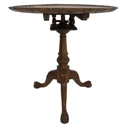 Georgian design hardwood tripod table, moulded pie-crust tilt-top, turned and fluted column carved with foliage, on three acanthus leaf carved splayed supports with ball and claw feet