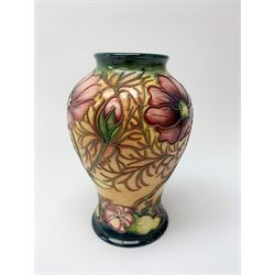 A Moorcroft vase, of baluster form, circa 2000, decorated in the Cosmos pattern, with impressed and painted marks beneath, H15.5cm. 