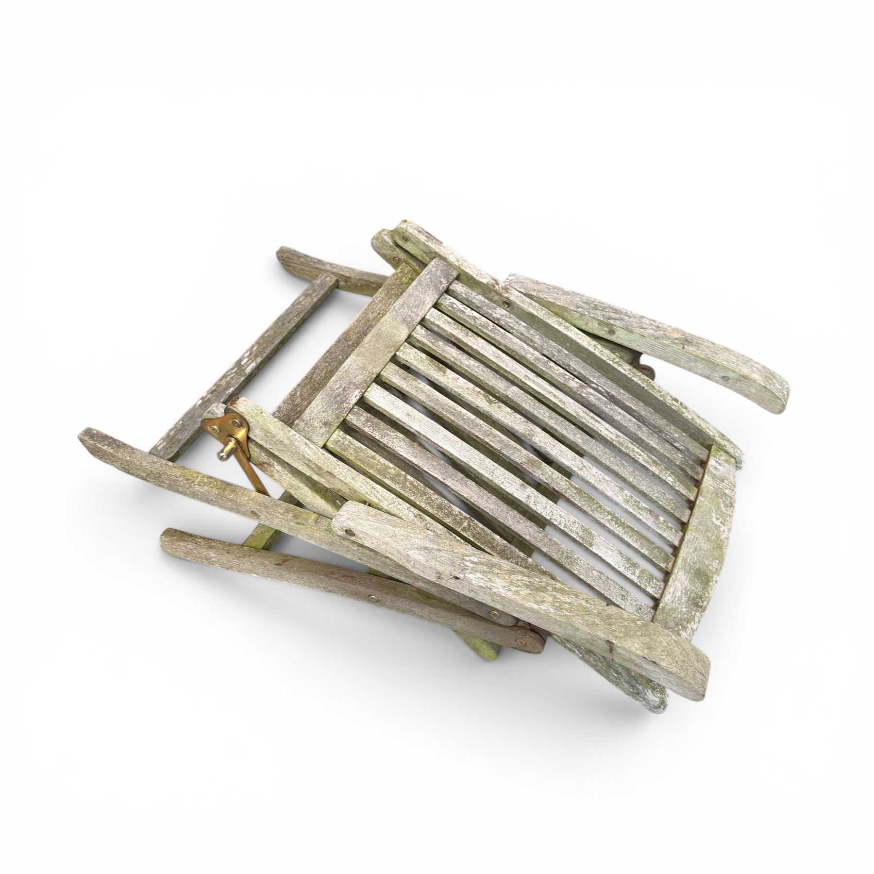 Five piece teak garden dining set, comprising circular folding table and four folding armchairs, with slatted seats and backs in a weathered finish