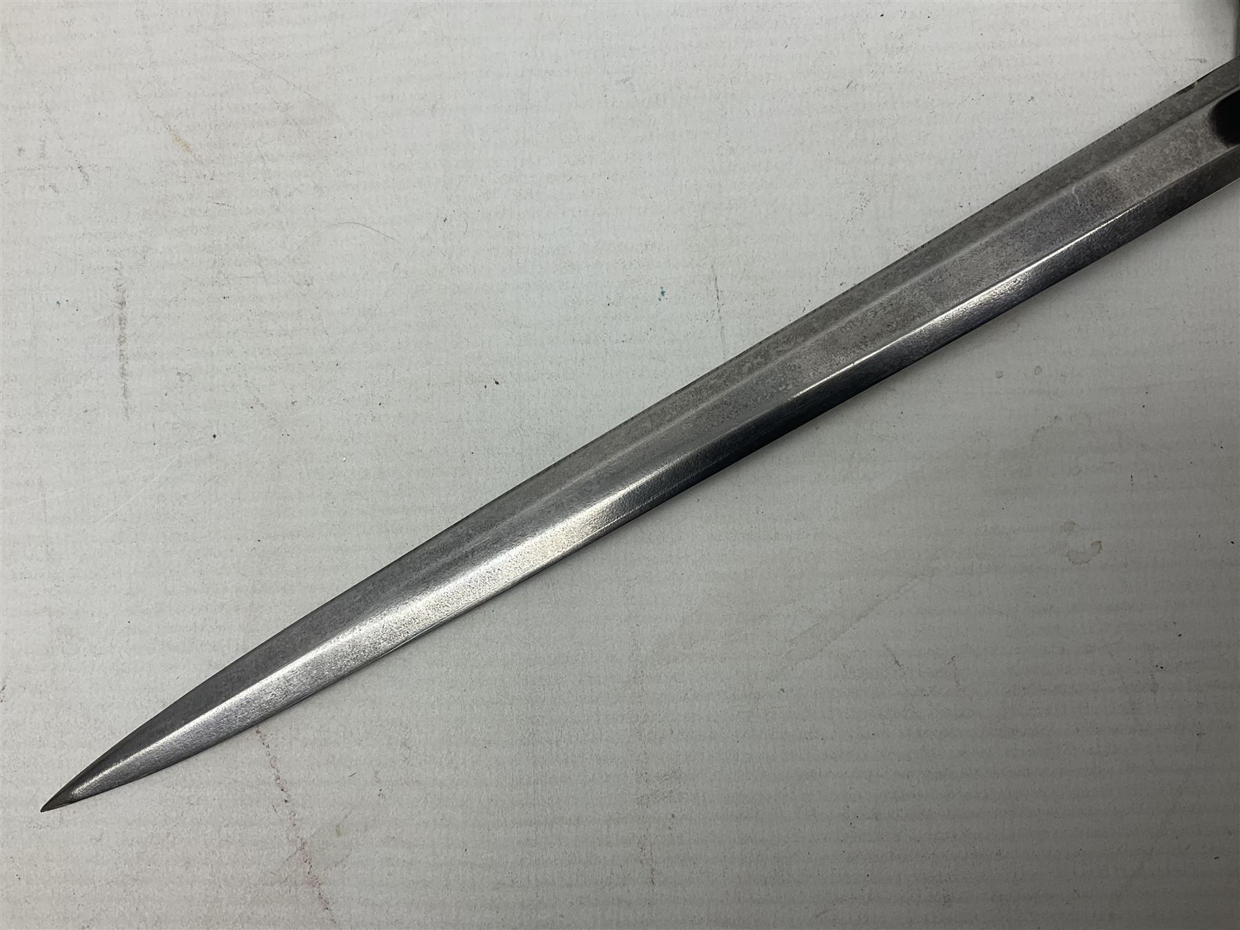 Late WW2 German Army Officers dress dagger, with unmarked 25cm double edged steel blade, orange celluloid grip, pommel and ferrule with oakleaves relief and cross guard with eagle; in original beaded scabbard with two hanging rings L39.5cm overall