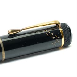 Montblanc Meisterstück Oscar Wilde limited edition fountain pen, black resin cap and barrel with marbled ivory and black patterned lower barrel and gold-plated fittings, the cap signed with Oscar Wilde facsimile and surmounted by the white star emblem, fitted with a medium 18K (750) gold nib engraved 4810, 1994 and MONTBLANC, model no. 28616, presented in original lined fitted case in the form of a book with outer box