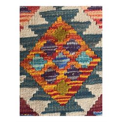Afghan Maimana flatweave Kilim rug, the field decorated with multi-coloured diamond motifs in a stepped formation, framed by a bold hourglass border,