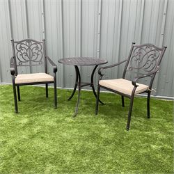 Cast metal garden table and two chairs - THIS LOT IS TO BE COLLECTED BY APPOINTMENT FROM DUGGLEBY STORAGE, GREAT HILL, EASTFIELD, SCARBOROUGH, YO11 3TX