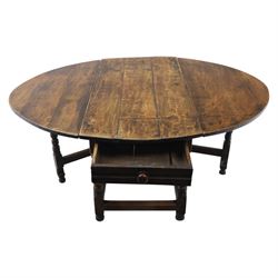 18th century country oak oval dining table, plank top with two drop leaves and gate-leg action, single drawer, raised on bobbin turned legs