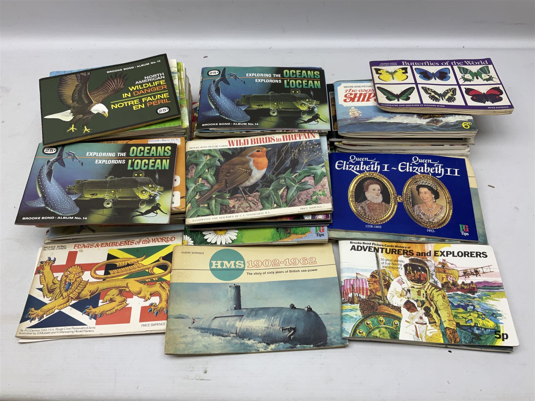 Over eighty trade card albums by Brooke Bond, Lyons, PG Tips, Hornimans, Ty-Phoo etc including some duplicates; and large quantity of loose trade cards