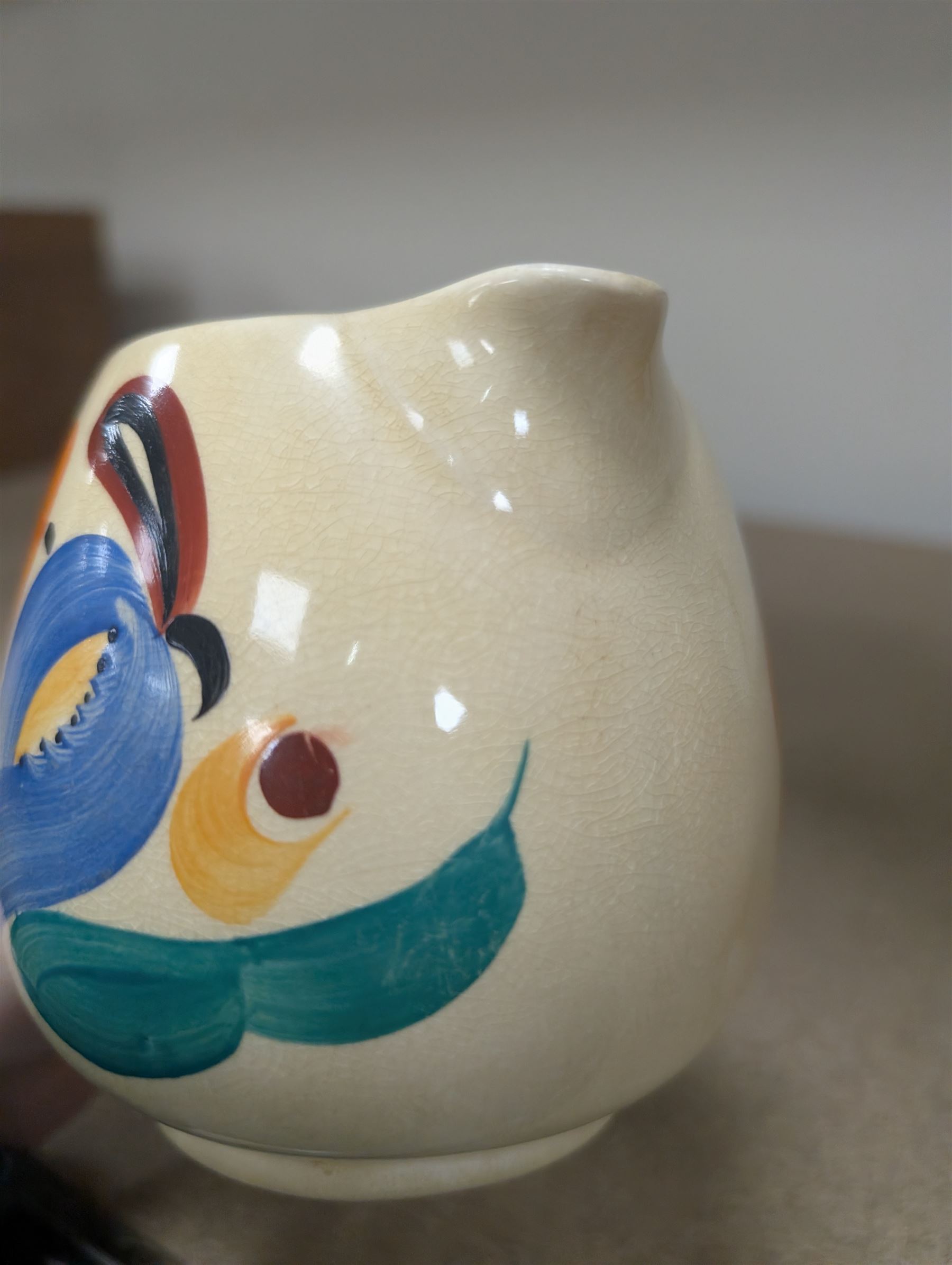 Collection of Susie Cooper ceramics, including jugs, vases and a teapot 