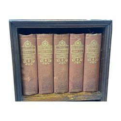 20th century oak barley twist gateleg table (W78cm); early 20th century narrow oak bookcase with Charles Dickens novels (W31cm, H93cm) 