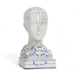 19th century Staffordshire pottery Phrenology head inkwell, circa 1860, the head mapped out, upon a scrolling base with pen/ink recesses and rectangular plinth impressed 'By F. Bridges Phrenologist', H14cm