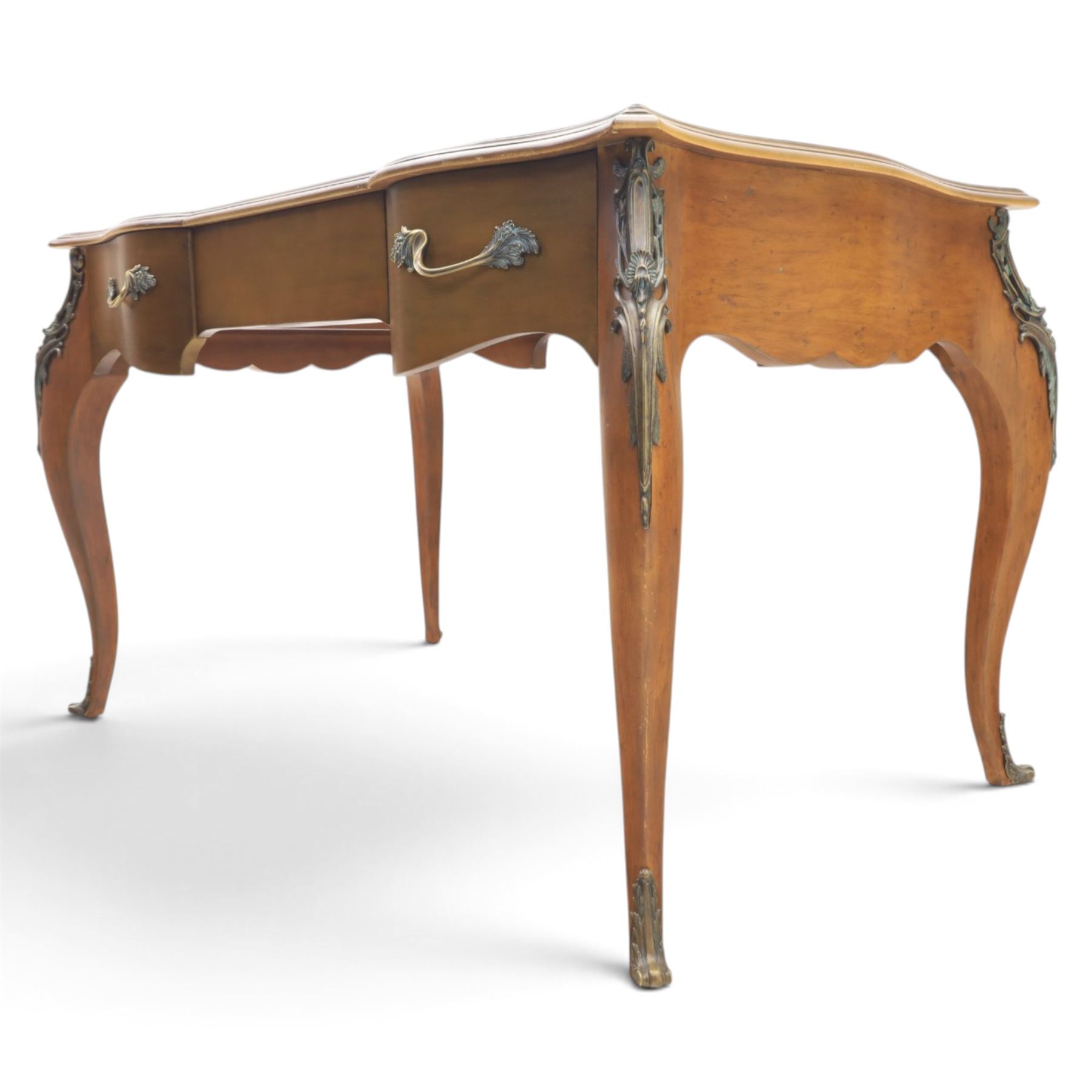 And So To Bed - Cherrywood serpentine dressing table, two drawers with brass handles foliate design with applied gilt mounts, raised on cabriole legs with gilt caps