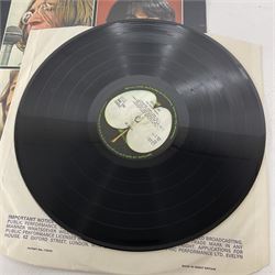 Eight The Beatles and related vinyl records, comprising With the Beatles, Parlophone PCS 3045 YEX 110 and 111, Let It Be, Apple Records, PCS 7096, YEX 773 and 774, Abbey Road, Apple Records, PCS 7088, YEX 749 and 750, Beatles for Sale, Parlophone PMCG 3, XEX 503 and 504, Revolver, Parlophone PCS 7009 YEX 605 and 606, Sgt Pepper's Lonely Hearts Club Band, with sheet, Parlophone PCS 7027 YEX 637 and 638, Ringo Starr It Doesn't Come Easy, 45 RPM Apple Label and McCartney by Paul McCartney