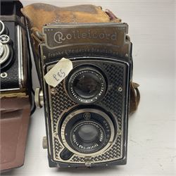 Franke & Heidecke Rolleicord twin lens camera, serial number 012706 with Heidoscop-Anastigmat f=7.5cm' lens and a 'Carl Zeiss Jena Triotar 1:4.5 f=7.5cm' lens, serial no 1474898, together with three similar cameras, including SEM TLR, serial no 420218, Ising Pucky box and Ferrania Elioflex, three in leather carry cases