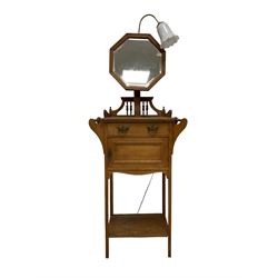 Late 19th to early 20th century oak washstand, the raised back with octagonal mirror with bevelled plate, rectangular top fitted with single drawer and cupboard with handles to each side, over under-tier, raised on square supports, with later light fitting