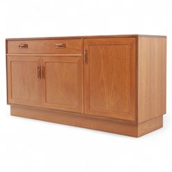 G Plan - Mid-20th century teak sideboard, fitted with single drawer above three cupboard doors, recessed handles throughout, raised on a plinth base