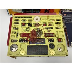 Meccano - Outfits 2, 3 & 4 with blue and yellow parts; look to be virtually complete with most apertures filled; together with a partially stocked Meccano Elekrikit; all boxed with instruction manuals (4)