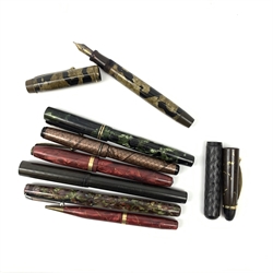 A group of Vintage pens, to include a Conway Stewart 84 lever filled fountain pen with nib marked 14ct,  a Parker Victory fountain pen with nib marked 14K, a Watermans lever filler, two Swan Self Filler Mabie Todd fountain pens with nibs marked 14ct, a further Swan Self Filler Mabie Todd (nib a/f), etc. 
