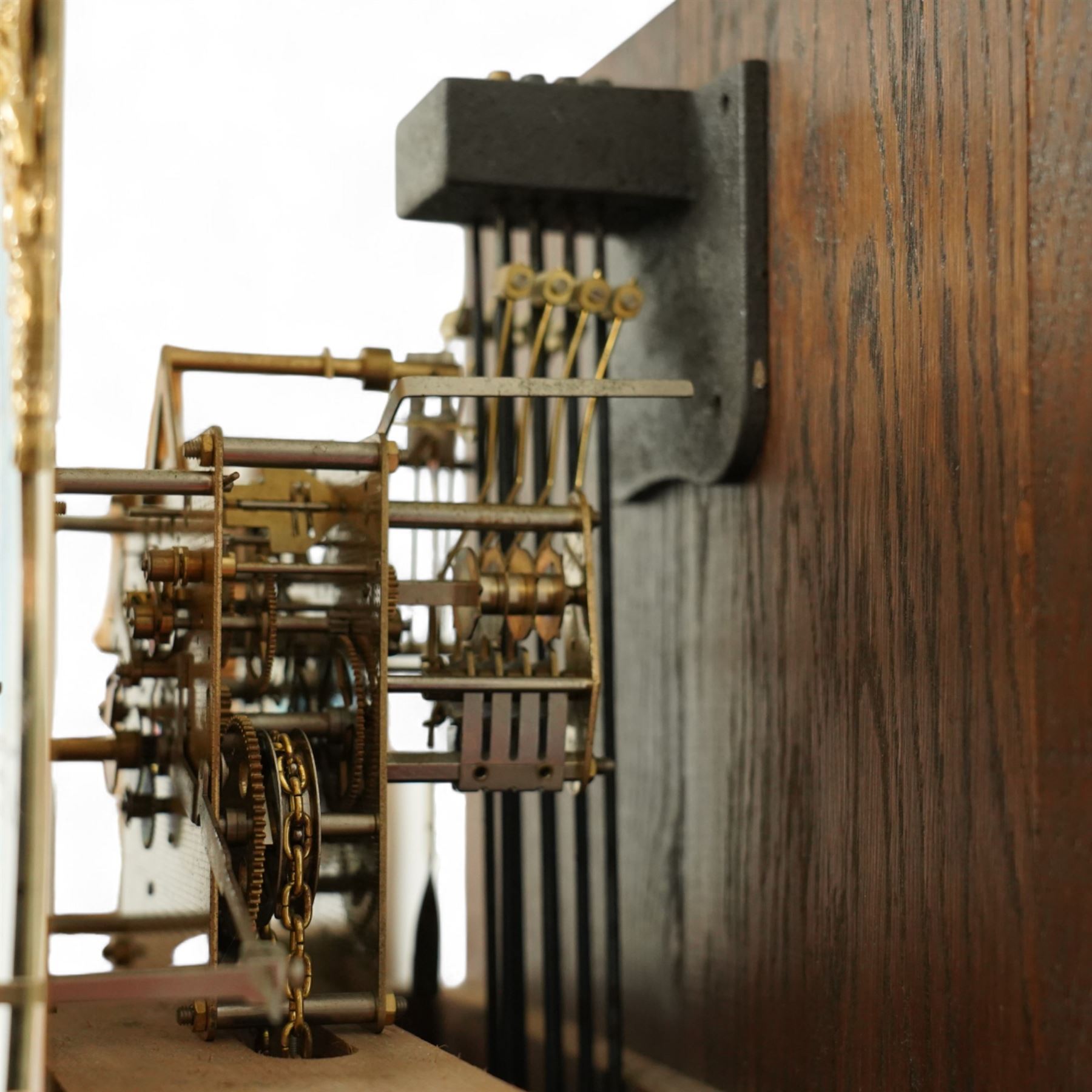 20th-century-oak cased  8-day longcase clock, in an 18th century provincial style case, square brass dial with an engraved centre, cast spandrels, steel hands and silvered chapter ring, dial engraved 