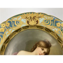 Late 19th century Vienna cabinet plate, finely painted with a semi nude portrait of a classical female beauty, within stylised gilt Art Nouveau floral and foliate shaped border upon alternating teal and pale blue ground, with underglazed blue beehive and impressed marks and entitled Ustana Dec:294 3676 / 294 27a, D24cm